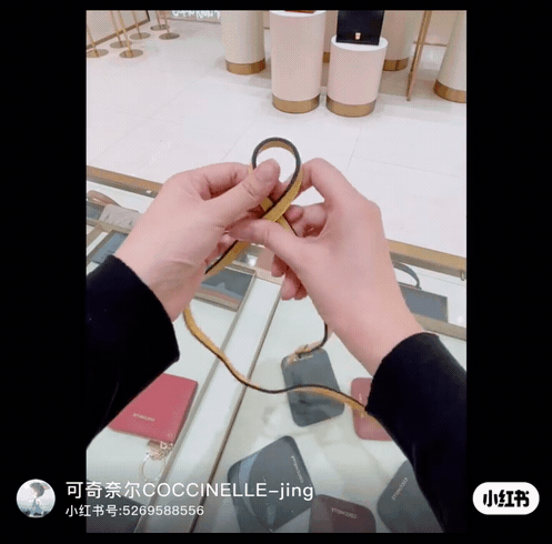 1 - 1.gif ▲背帶縮短繞圈法教學